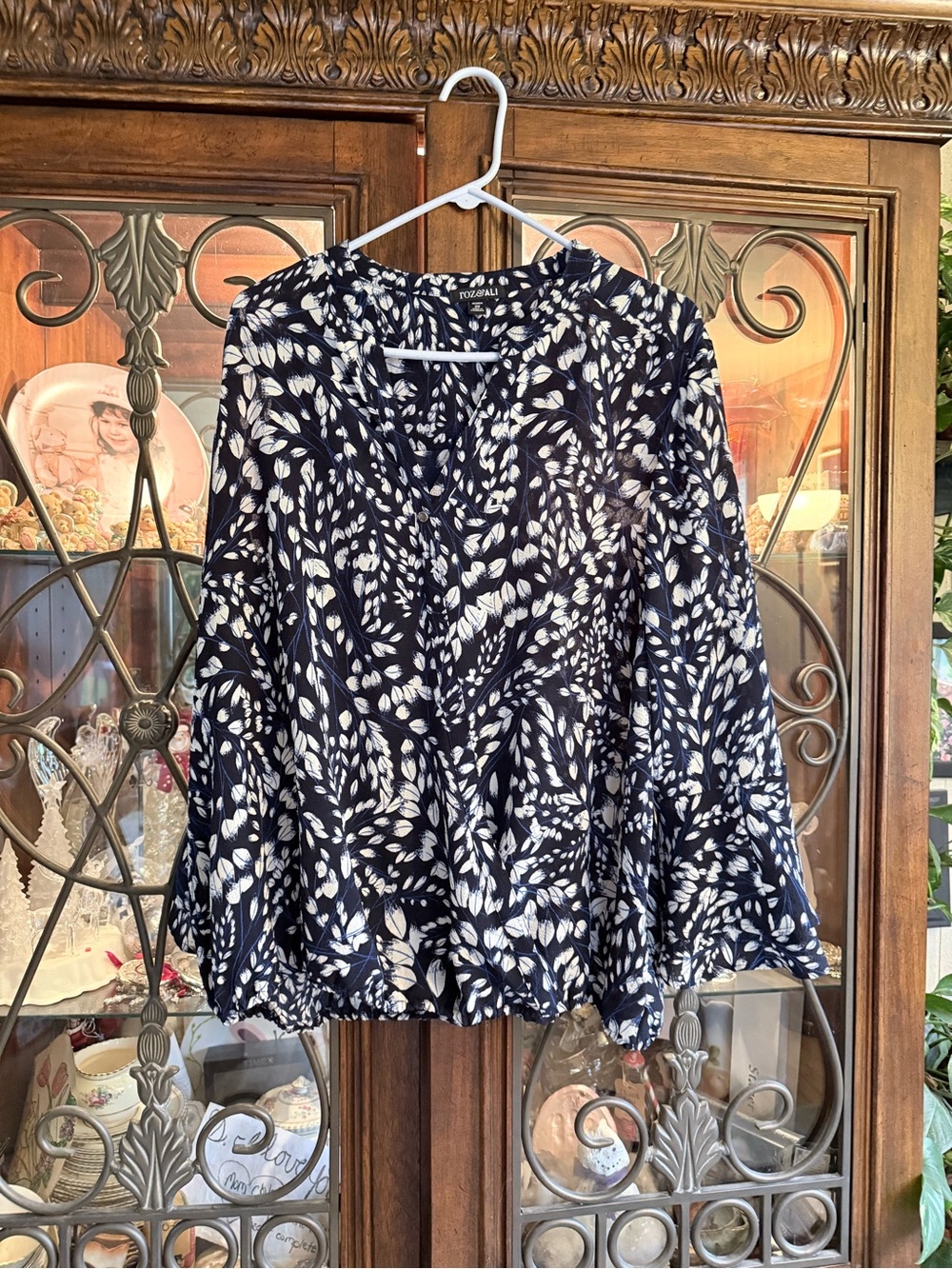 Roz & Ali Navy and White Leaf-Print V-Neck Peplum Blouse